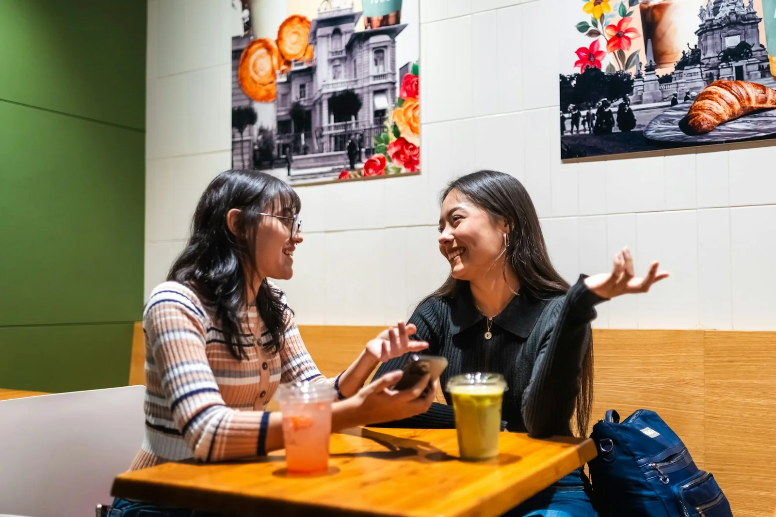 Friends sharing time together in a bright café